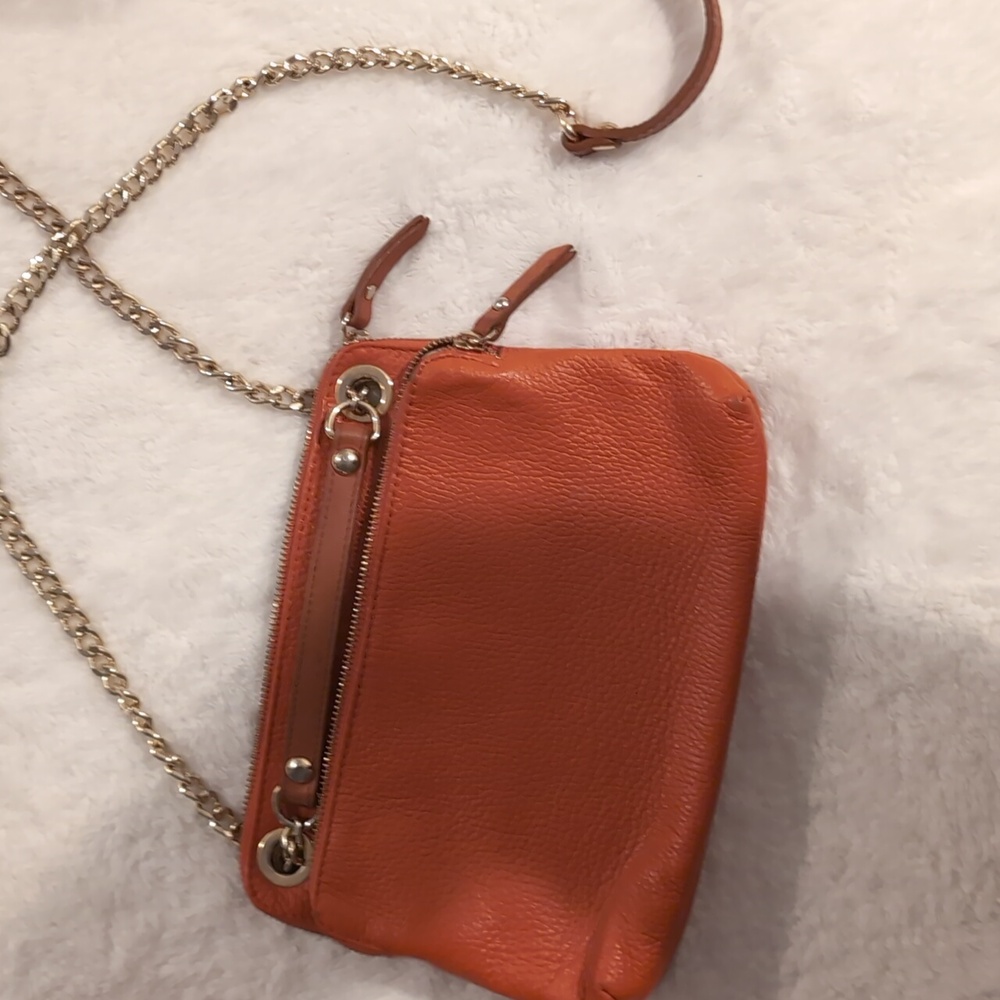 Chic Orange Handbag with Chain Straps